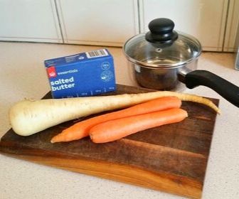 carrots, parsnip. butter, and steel pot to puree baby food